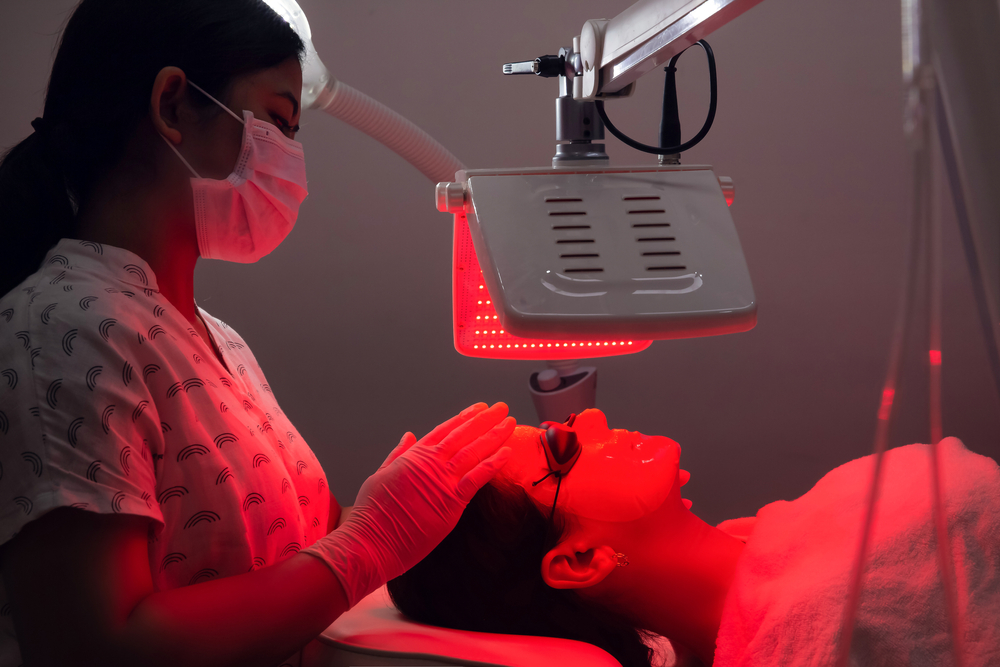 Young,Woman,Having,Red,Led,Light,Facial,Therapy,Treatment,In