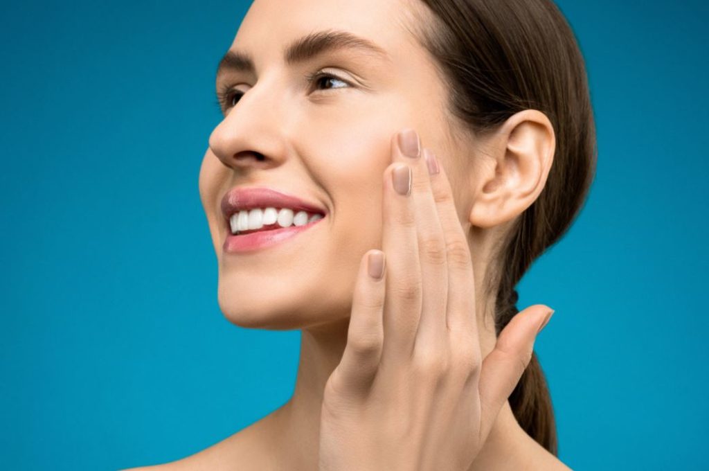 woman dry nose treatments - source:pexels